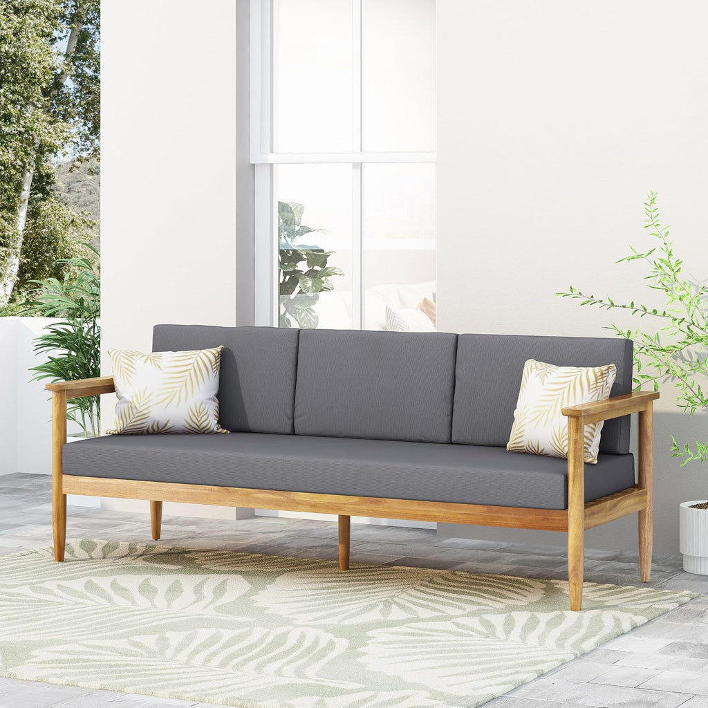 Christopher Knight Home Gaviaz Acacia Wood Outdoor 3 Seater Sofa, 76'' Modern Patio Couch with Water-Resistant Cushions and Open Slat Design for Garden Poolside Deck, Dark Gray